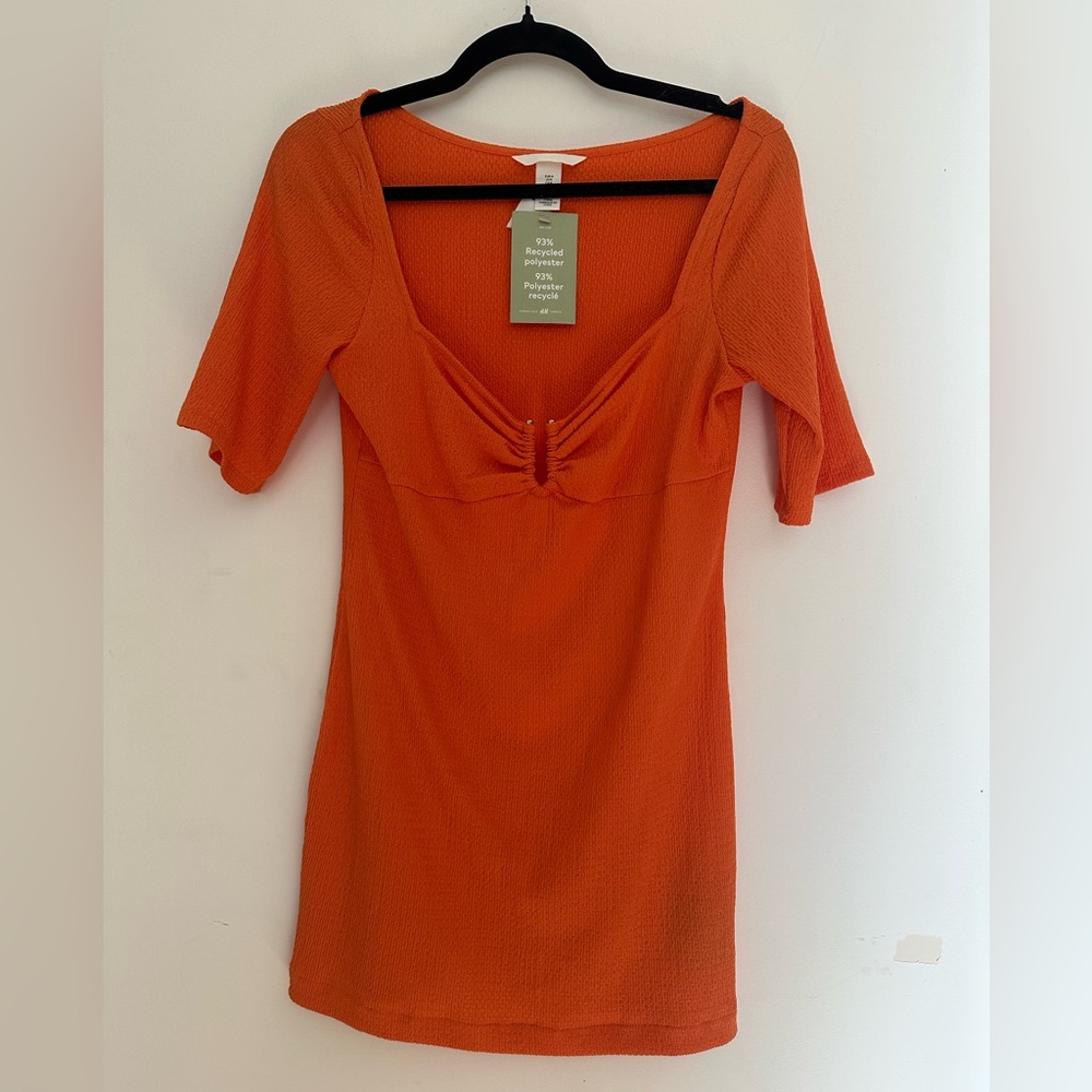 H&M orange dress size medium. NWT